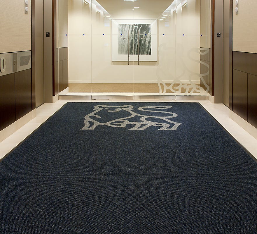 Super Nop® 52 and Super Nop® 52 Logo colorways shown here in Merrill Lynch Logo Carpet Mat created with Logo Matting available at Mats Inc. and Matter Surfaces. 